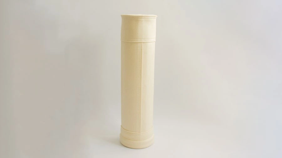 Aramid scrimless filter bag construction detail